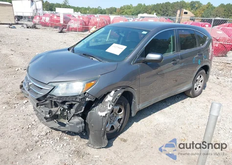 2014 Honda Cr-V Lx z USA, uszkodzony, nr VIN 2HKRM3H32EH517841